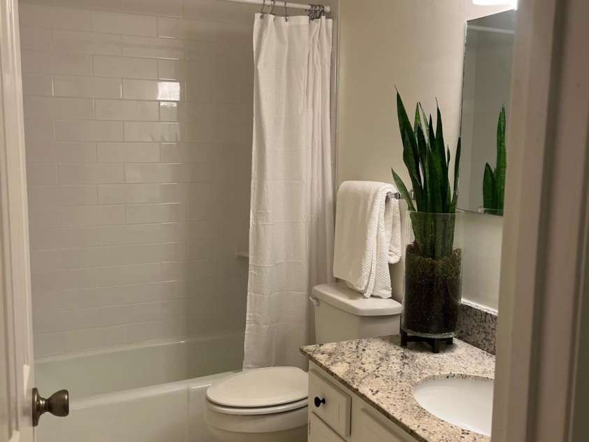 4520 Central Avenue, Charlotte, NC 28205.  MLS# CAR4231851, YatesRealty ID 19799. Upstairs full bath with new tile