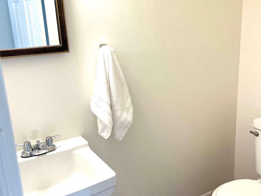 4520 Central Avenue, Charlotte, NC 28205.  MLS# CAR4318622, YatesRealty ID 19799. Downstairs powder room bath