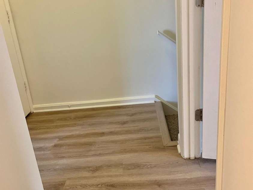 4520 Central Avenue, Charlotte, NC 28205.  MLS# CAR4318622, YatesRealty ID 19799. Upstairs Landing. 2 bedrooms, a full bath and linen closet is off this landing