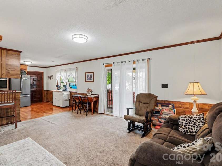 105 Fox Fire Run, Gastonia, NC 28052.  MLS# CAR4378985, YatesRealty ID 19808. Family room open concept with kitchen