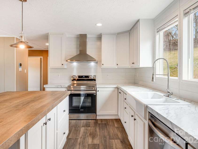 96 Sandons Trail, Marshall, NC 28753.  MLS# CAR4224480, YatesRealty ID 19813. Farmhouse style kitchen