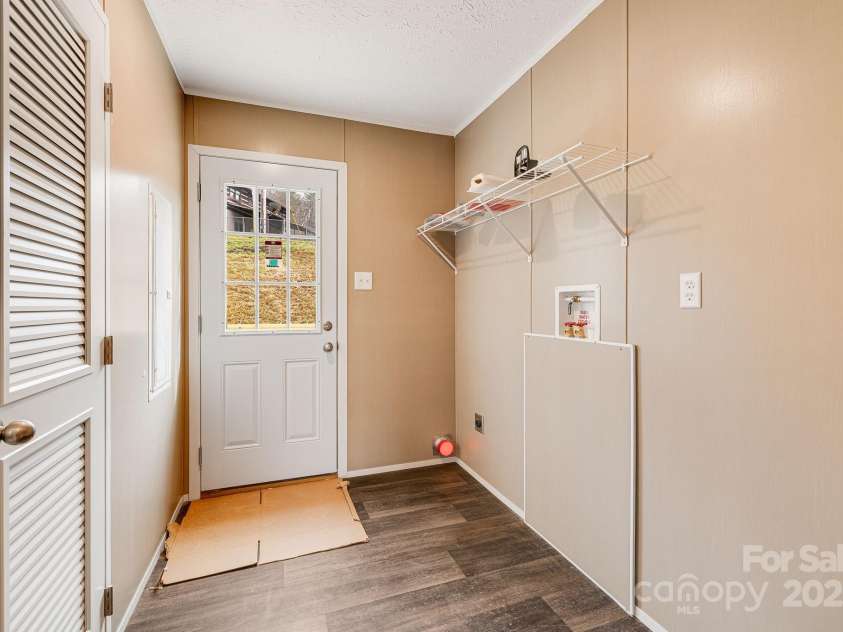 96 Sandons Trail, Marshall, NC 28753.  MLS# CAR4224480, YatesRealty ID 19813. Laundry hook ups/ Back door
