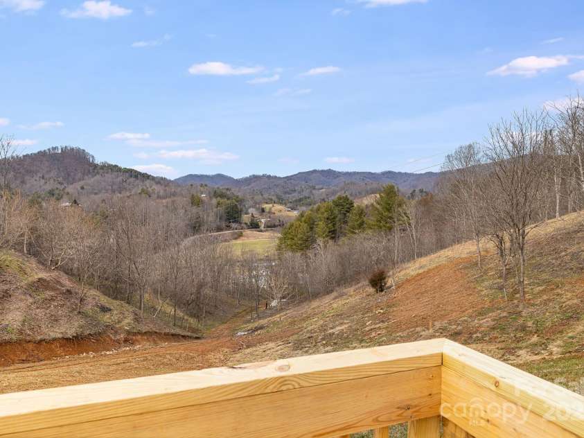 96 Sandons Trail, Marshall, NC 28753.  MLS# CAR4224480, YatesRealty ID 19813. Mountain view off the front deck