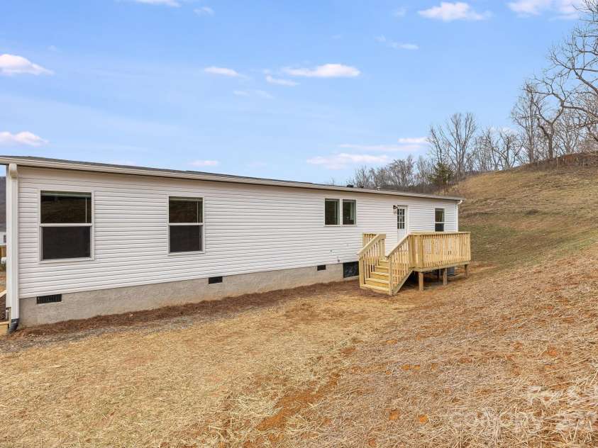 96 Sandons Trail, Marshall, NC 28753.  MLS# CAR4224480, YatesRealty ID 19813. Rear deck