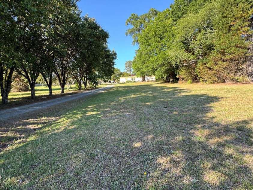 3227 Pleasant Plains Road, Matthews, NC 28105.  MLS# CAR4379724, YatesRealty ID 19817. 
