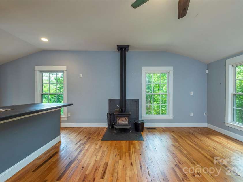 379 Rainbow Terrace, Black Mountain, NC 28711.  MLS# CAR4267468, YatesRealty ID 19819. Wood burning stove