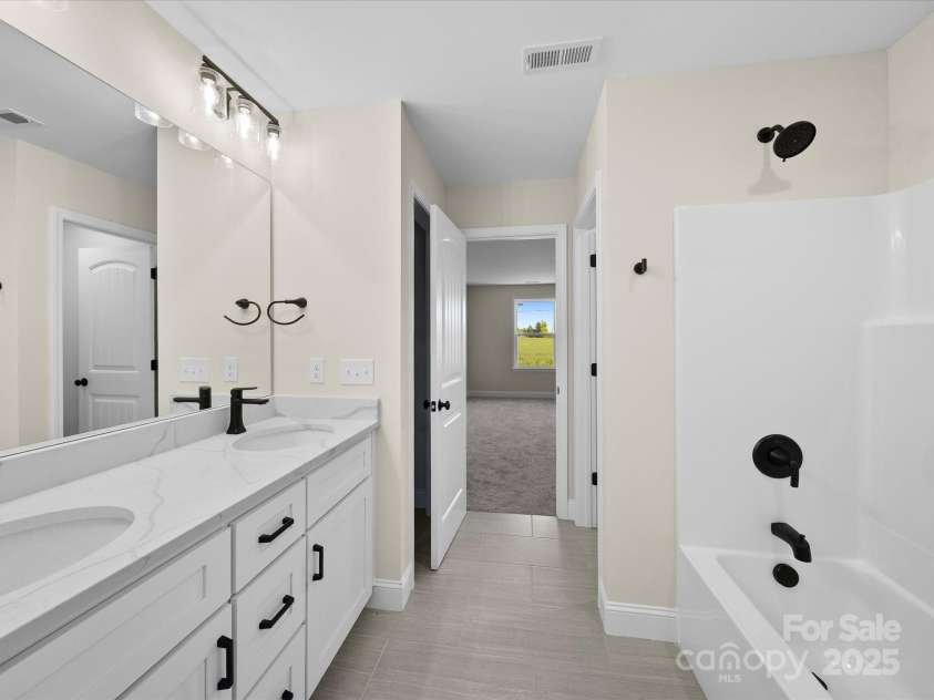 3012 Isle Lane, Monroe, NC 28110.  MLS# CAR4246920, YatesRealty ID 19822. Primary Bathroom