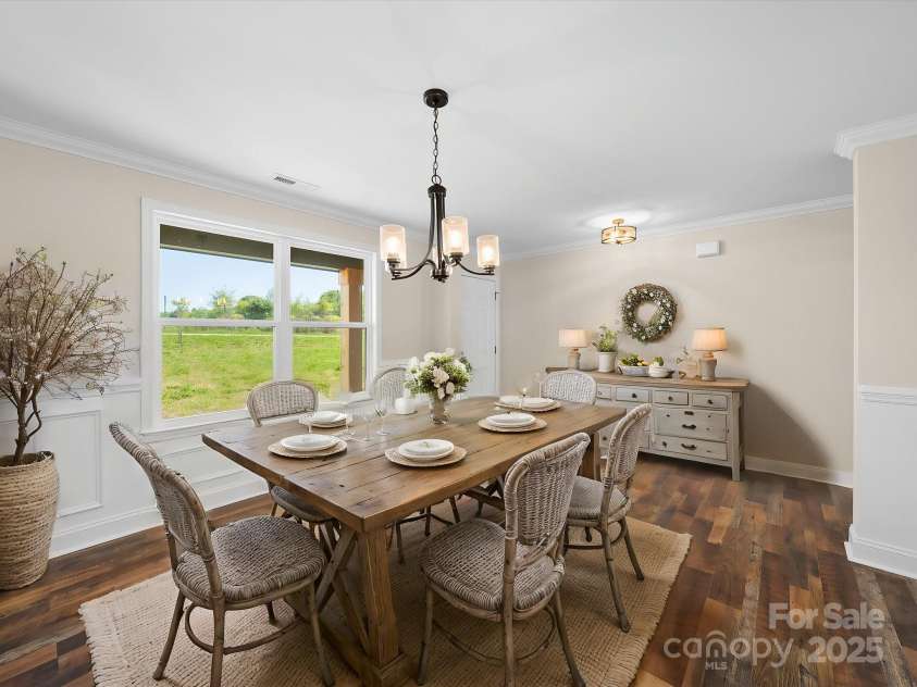 3012 Isle Lane, Monroe, NC 28110.  MLS# CAR4246920, YatesRealty ID 19822. Virtually Staged Dining Room