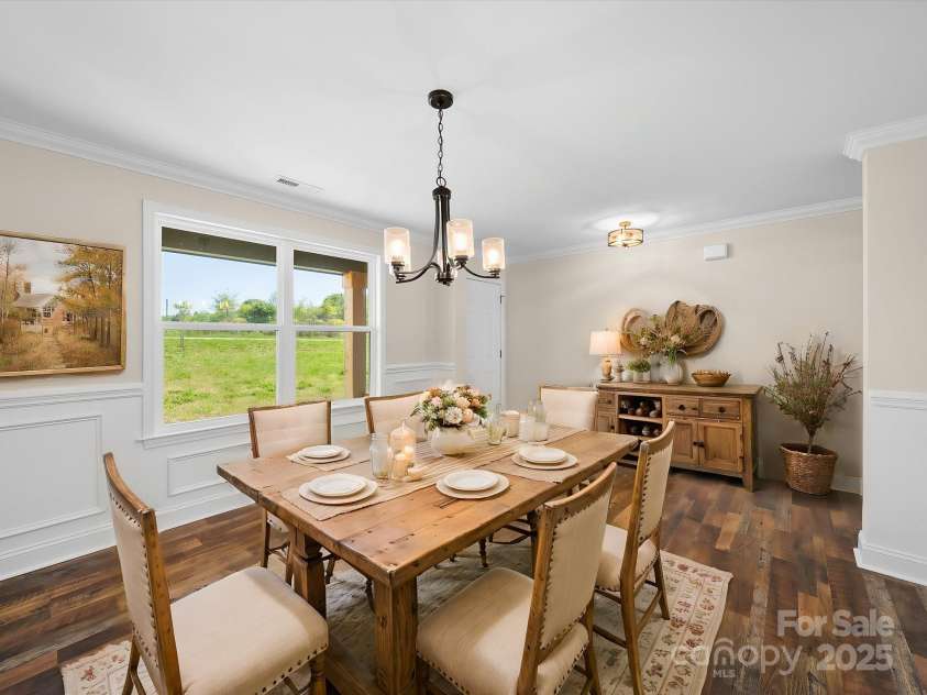3012 Isle Lane, Monroe, NC 28110.  MLS# CAR4246920, YatesRealty ID 19822. Virtually Staged Dining Room