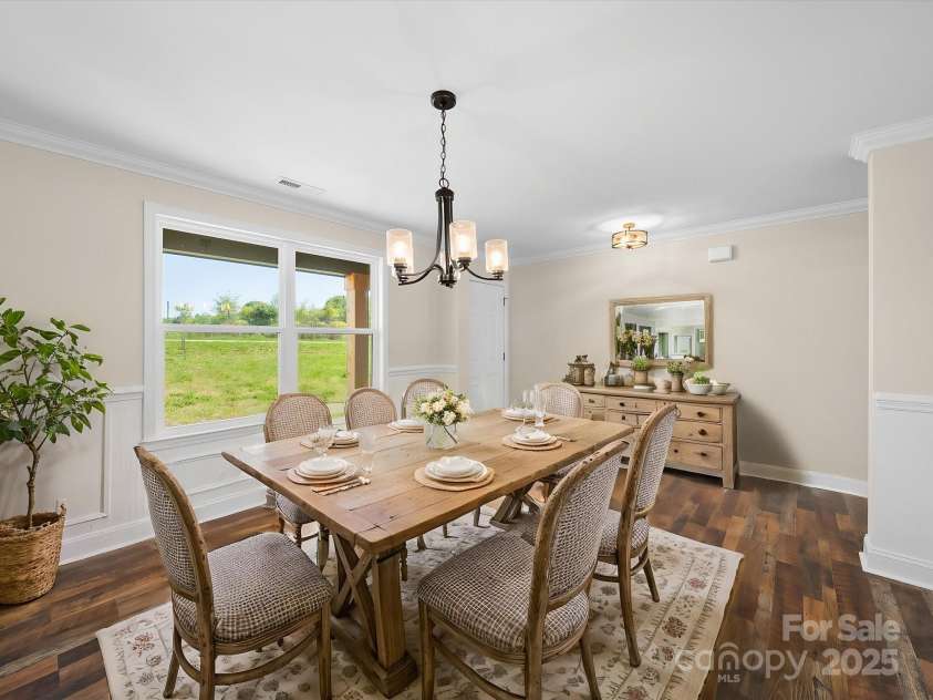3012 Isle Lane, Monroe, NC 28110.  MLS# CAR4246920, YatesRealty ID 19822. Virtually Staged Dining Room