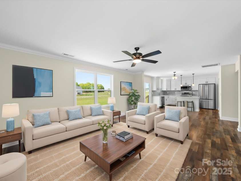 3012 Isle Lane, Monroe, NC 28110.  MLS# CAR4246920, YatesRealty ID 19822. Virtually Staged Great Room