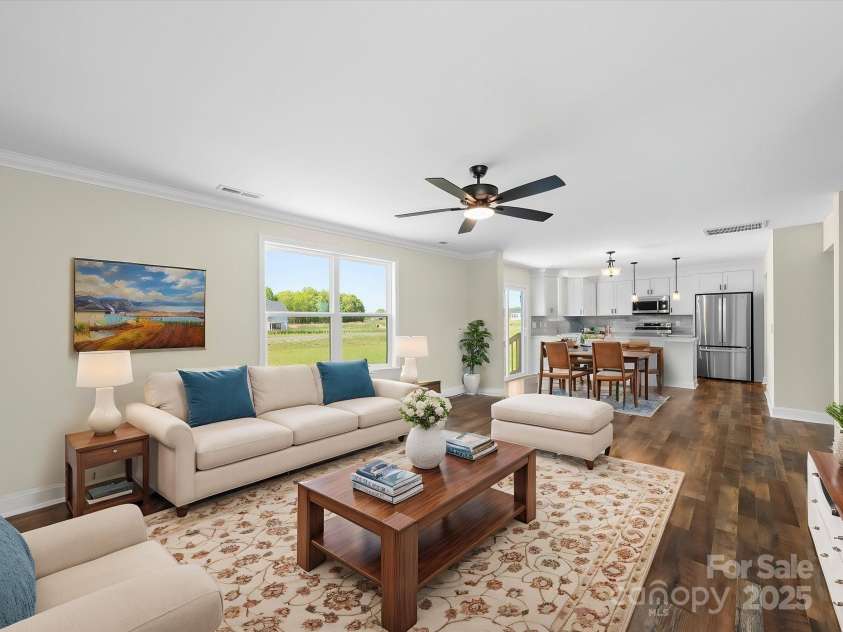 3012 Isle Lane, Monroe, NC 28110.  MLS# CAR4246920, YatesRealty ID 19822. Virtually Staged Great Room