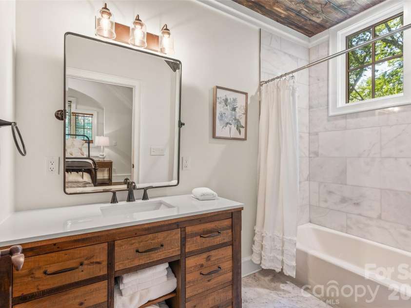 48 Bearfoot Lane, Highlands, NC 28741.  MLS# CAR4379845, YatesRealty ID 19825. Ensuite Guest Bath 2