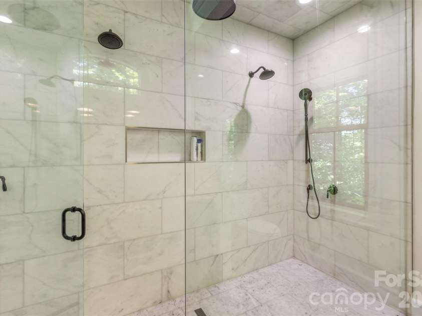 48 Bearfoot Lane, Highlands, NC 28741.  MLS# CAR4379845, YatesRealty ID 19825. Large walk-in shower Primary bath