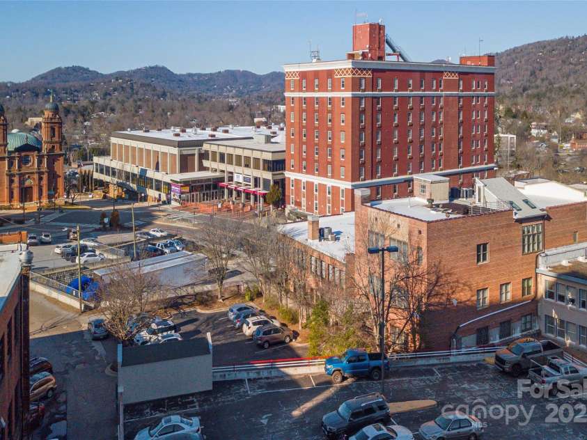 60 Haywood Street, Asheville, NC 28801.  MLS# CAR4269885, YatesRealty ID 19828. Across from Basilica, Library and the civic center.