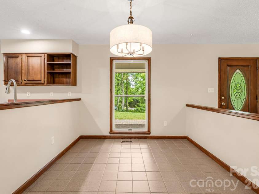 35 Byrd Road, Candler, NC 28715.  MLS# CAR4379213, YatesRealty ID 19829. Dining Area