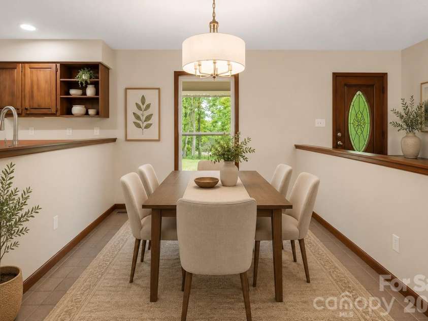 35 Byrd Road, Candler, NC 28715.  MLS# CAR4379213, YatesRealty ID 19829. Dining Virtually Staged