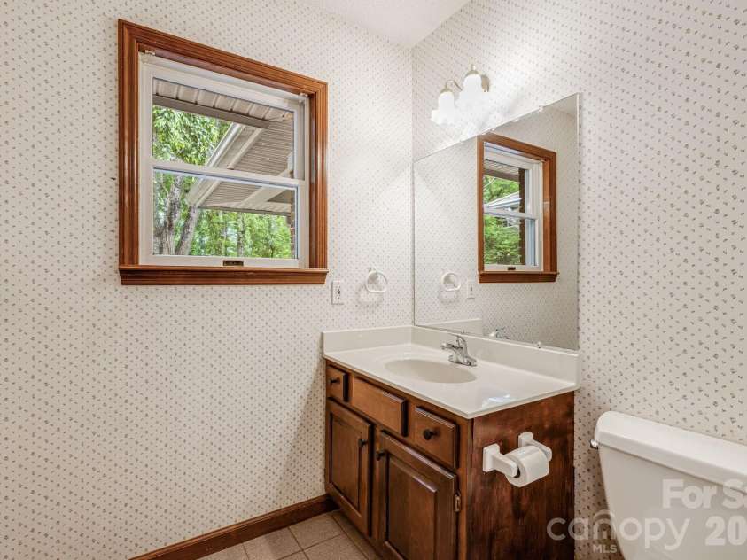 35 Byrd Road, Candler, NC 28715.  MLS# CAR4379213, YatesRealty ID 19829. Half bath 