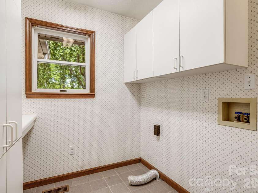 35 Byrd Road, Candler, NC 28715.  MLS# CAR4379213, YatesRealty ID 19829. Laundry Area