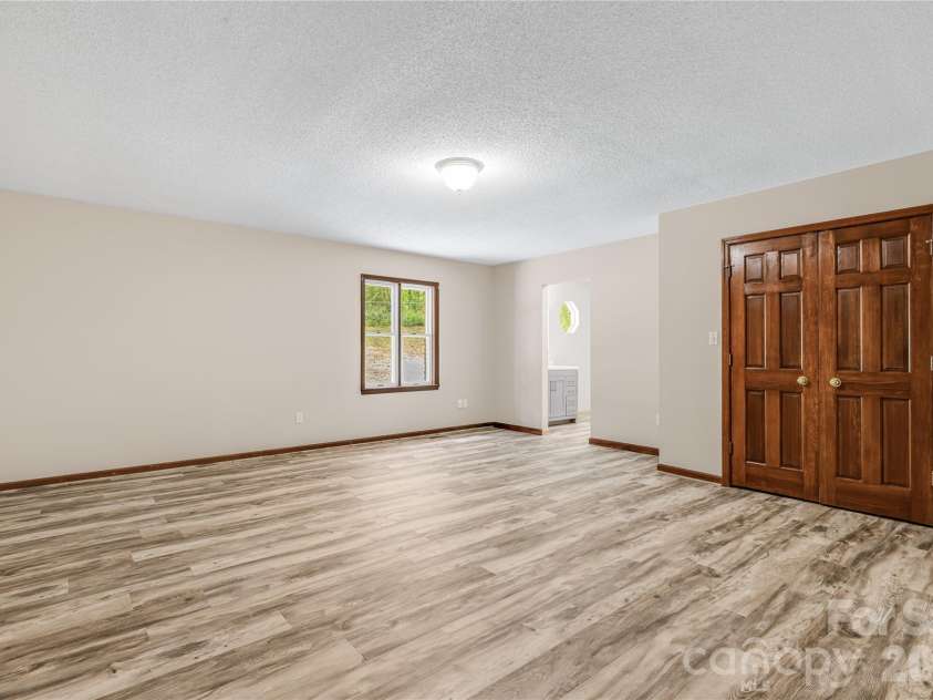 35 Byrd Road, Candler, NC 28715.  MLS# CAR4379213, YatesRealty ID 19829. Master Bedroom 