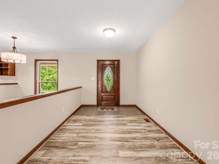35 Byrd Road, Candler, NC 28715.  MLS# CAR4379213, YatesRealty ID 19829. Separate Entry