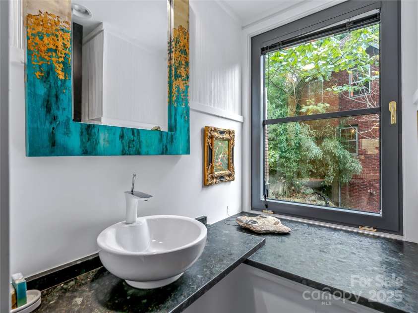 53 Buchanan Place, Asheville, NC 28801.  MLS# CAR4257148, YatesRealty ID 19830. Half bath on main level