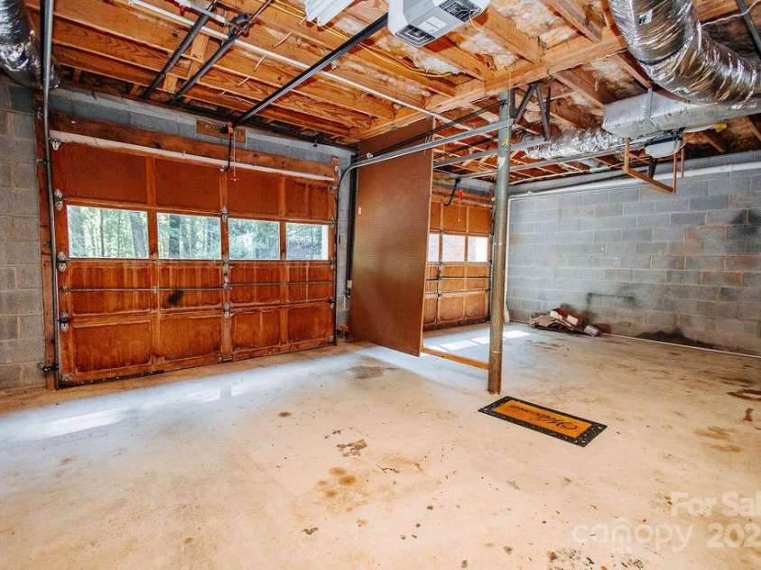 277 Forest Road, Marion, NC 28752.  MLS# CAR4252447, YatesRealty ID 19831. 2 car garage in lower level