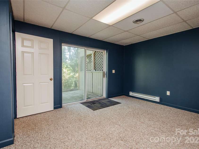 277 Forest Road, Marion, NC 28752.  MLS# CAR4252447, YatesRealty ID 19831. Another view of lower level den