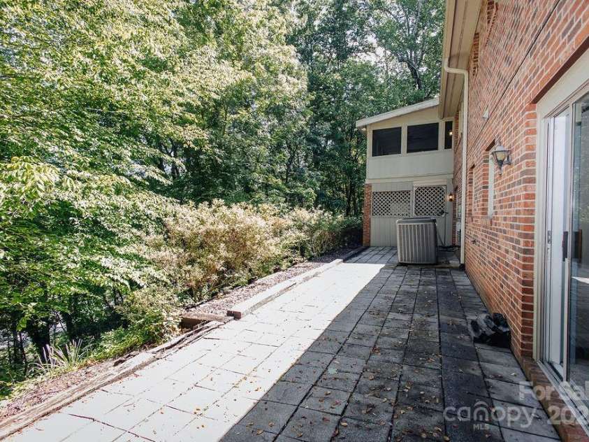 277 Forest Road, Marion, NC 28752.  MLS# CAR4252447, YatesRealty ID 19831. Back of home has storage under the deck