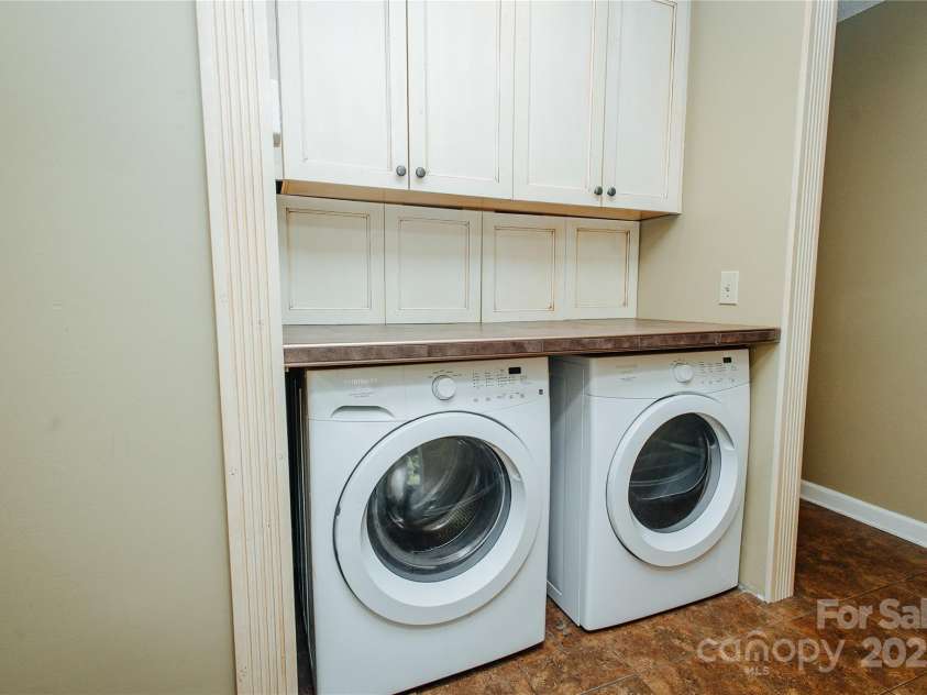 277 Forest Road, Marion, NC 28752.  MLS# CAR4252447, YatesRealty ID 19831. Laundry is located on main level near he bedrooms