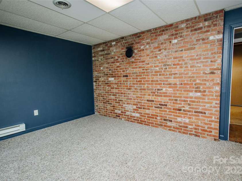 277 Forest Road, Marion, NC 28752.  MLS# CAR4252447, YatesRealty ID 19831. Lower level den