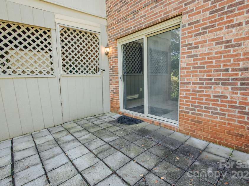 277 Forest Road, Marion, NC 28752.  MLS# CAR4252447, YatesRealty ID 19831. Sliding doors from the downstairs den