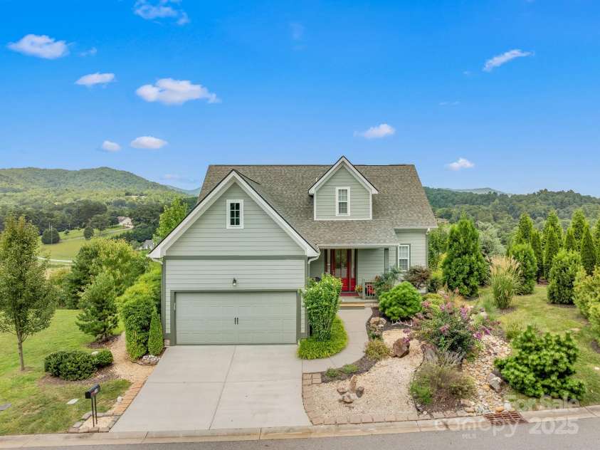 50 Rose Creek Road, Leicester, NC 28748.  MLS# CAR4228303, YatesRealty ID 19833. Breathtaking year-round views