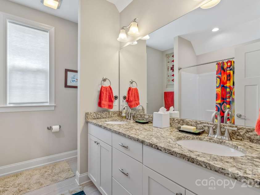 50 Rose Creek Road, Leicester, NC 28748.  MLS# CAR4228303, YatesRealty ID 19833. Double sink vanity upstairs