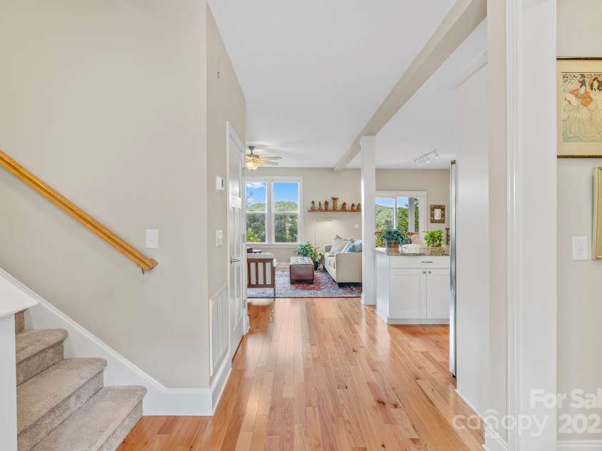 50 Rose Creek Road, Leicester, NC 28748.  MLS# CAR4228303, YatesRealty ID 19833. Gleaming hardwood floors and 9' ceilings