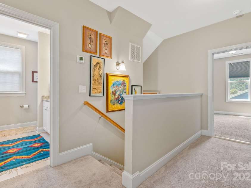 50 Rose Creek Road, Leicester, NC 28748.  MLS# CAR4228303, YatesRealty ID 19833. Upstairs bathroom and hallway