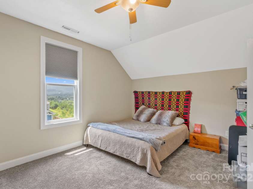 50 Rose Creek Road, Leicester, NC 28748.  MLS# CAR4228303, YatesRealty ID 19833. Upstairs bedrooms have carpet