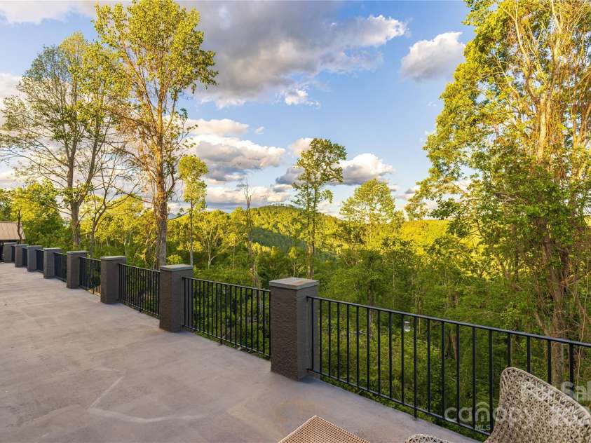 29 Crowningway Drive, Asheville, NC 28804.  MLS# CAR4263442, YatesRealty ID 19834. Large beck deck