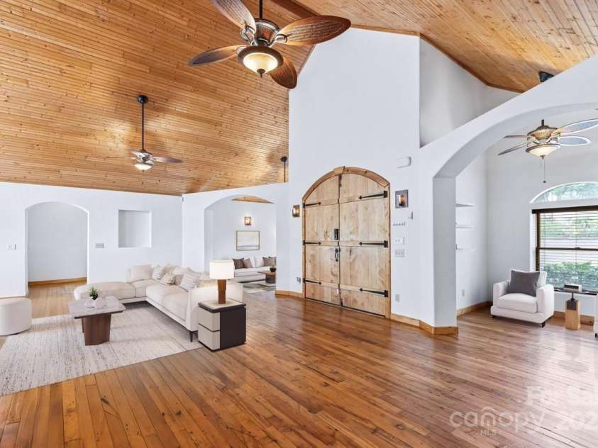 29 Crowningway Drive, Asheville, NC 28804.  MLS# CAR4263442, YatesRealty ID 19834. Living room, with virtual staging.