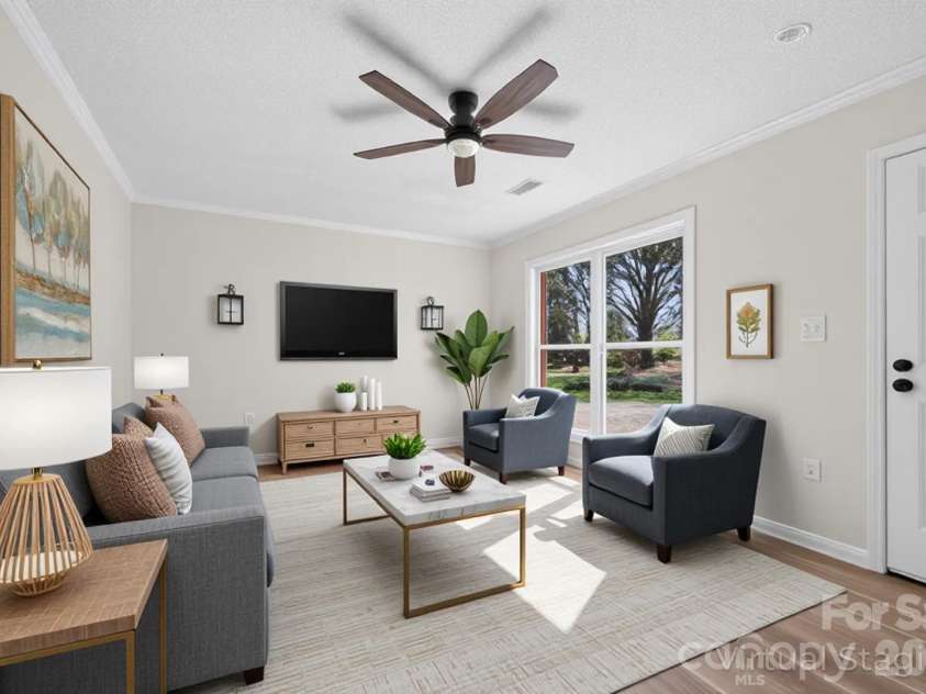 2016 Bryant Street, Madison, NC 27025.  MLS# CAR4365131, YatesRealty ID 19837. Virtually Staged