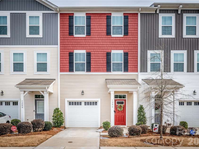 1206 Keydet Drive, Charlotte, NC 28216.  MLS# CAR4345736, YatesRealty ID 1984. Covered Entry w/front facing garage!