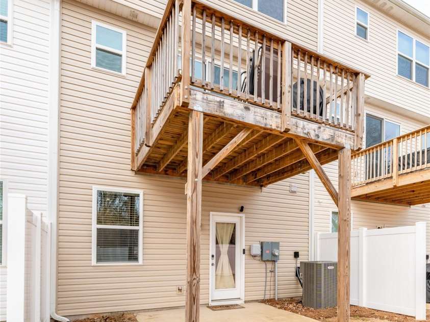 1206 Keydet Drive, Charlotte, NC 28216.  MLS# CAR4345736, YatesRealty ID 1984. Covered ground level patio and middle level deck!