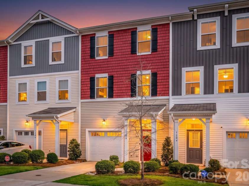 1206 Keydet Drive, Charlotte, NC 28216.  MLS# CAR4345736, YatesRealty ID 1984. Enhanced nightview!