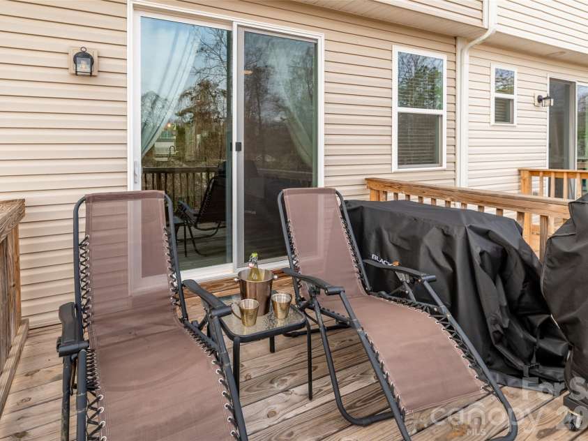 1206 Keydet Drive, Charlotte, NC 28216.  MLS# CAR4345736, YatesRealty ID 1984. Relax on the back deck!
