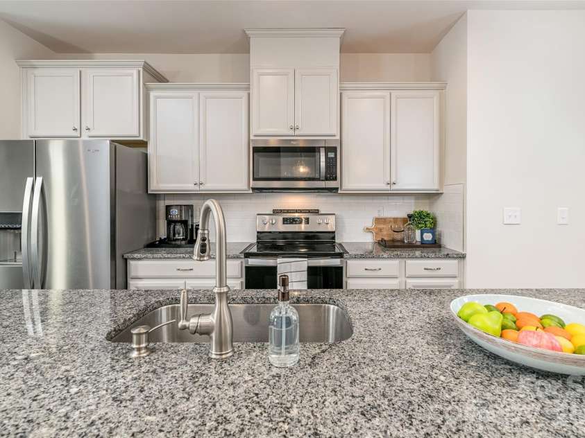 1206 Keydet Drive, Charlotte, NC 28216.  MLS# CAR4345736, YatesRealty ID 1984. Spacious kitchen island!
