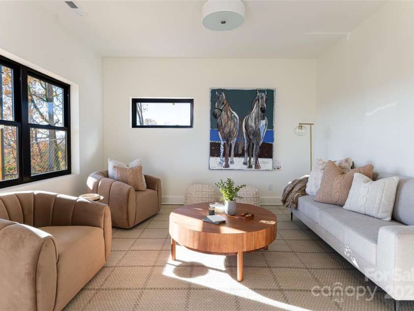 608 Storybook Villas Trail, Asheville, NC 28804.  MLS# CAR4294155, YatesRealty ID 1984. Lower level family room - Similar