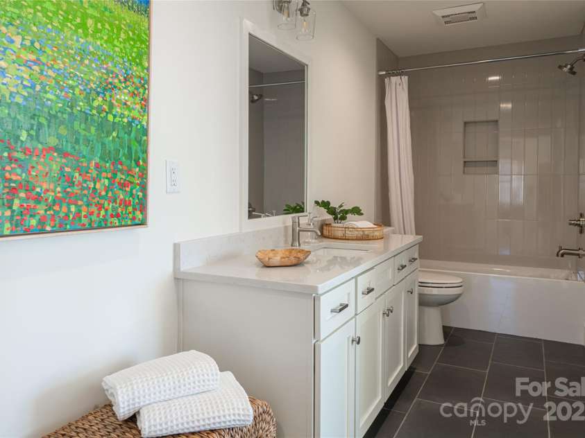 608 Storybook Villas Trail, Asheville, NC 28804.  MLS# CAR4294155, YatesRealty ID 1984. Lower level guest bedroom 2- Similar