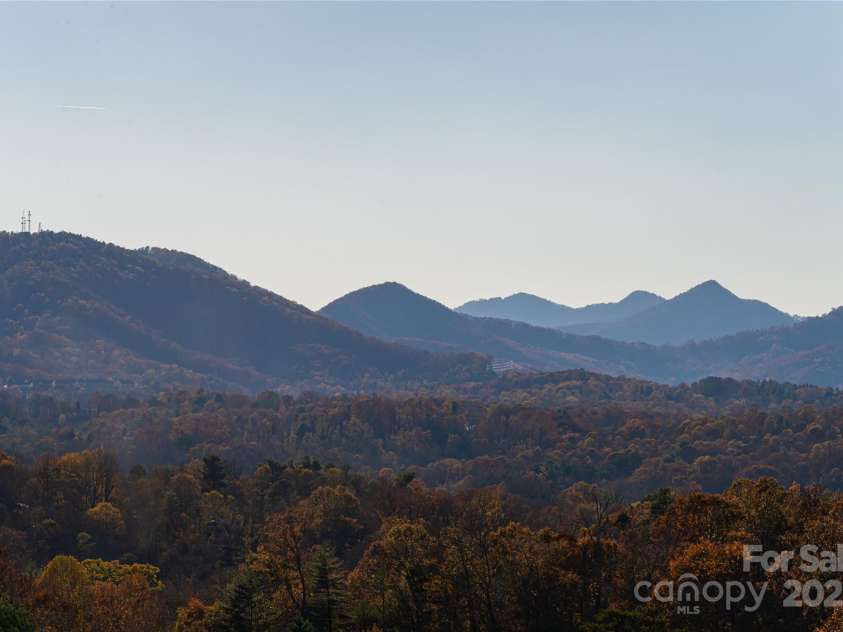 608 Storybook Villas Trail, Asheville, NC 28804.  MLS# CAR4294155, YatesRealty ID 1984. Views from back deck - similar