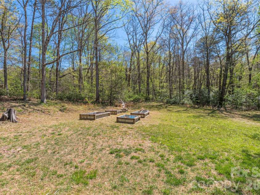 35 Grey Rock Valley, Black Mountain, NC 28711.  MLS# CAR4359846, YatesRealty ID 19842. Full sun garden space with several raised beds 