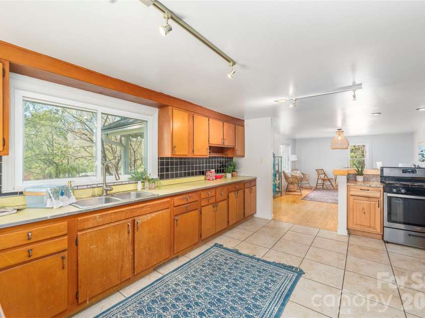 35 Grey Rock Valley, Black Mountain, NC 28711.  MLS# CAR4359846, YatesRealty ID 19842. Vintage 1950s maple cabinets 